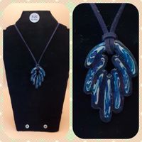 Blue and purple feather pendant