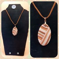 Pink brown and cream woven pendant
