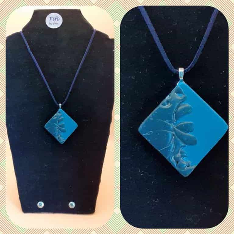 Blue and navy diamond pendant