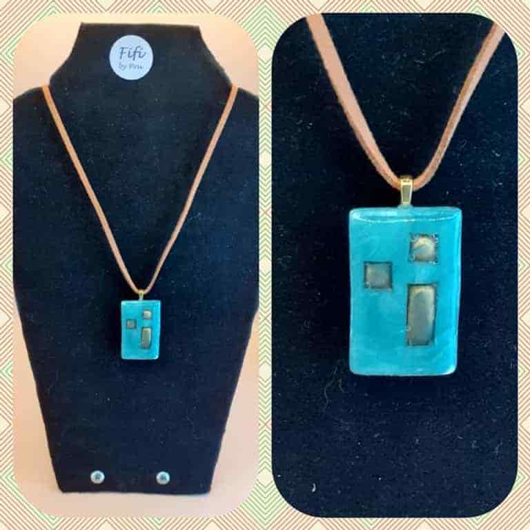 Turquoise and gold pendant