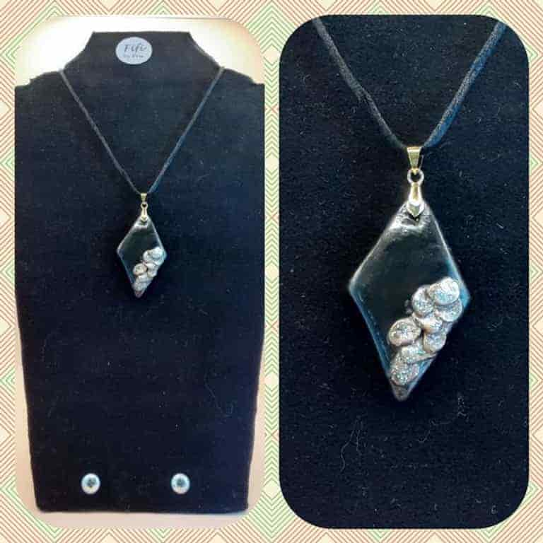 Black and silver pendant