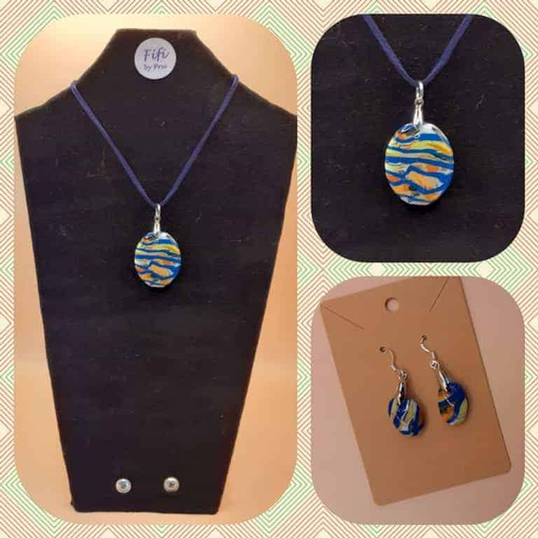 Blue and yellow pendant and earrings