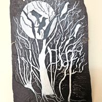 Crows roost on winter branches illuminated by a silver moon