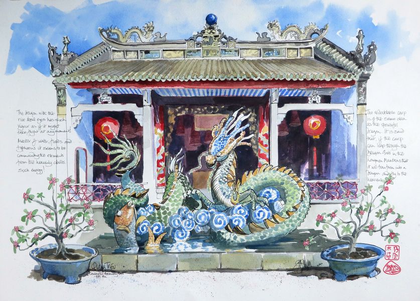 A dragon and koi fountain in a temple garden Vietnam Hoi An