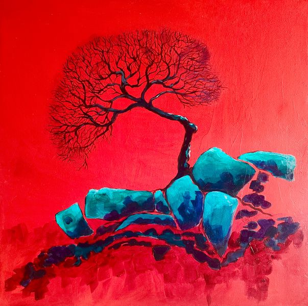 A lone winter tree in a rocky outcrop
