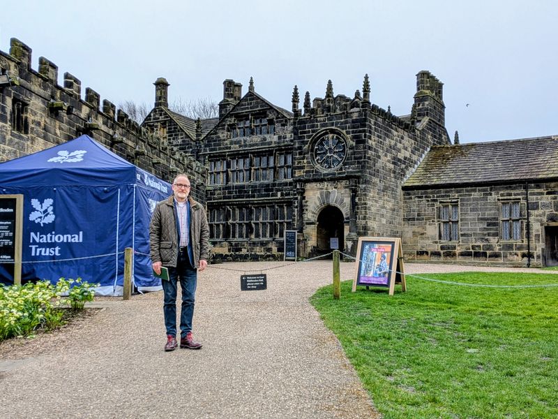Matthew Eyles standing in front of East Riddlesden Hall