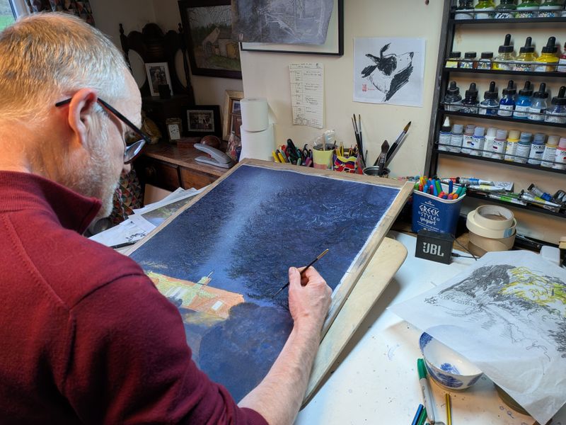 Matthew Eyles working on Christmas Lights painting.