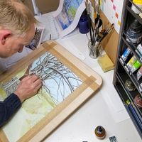 Matthew Eyles painting a commission