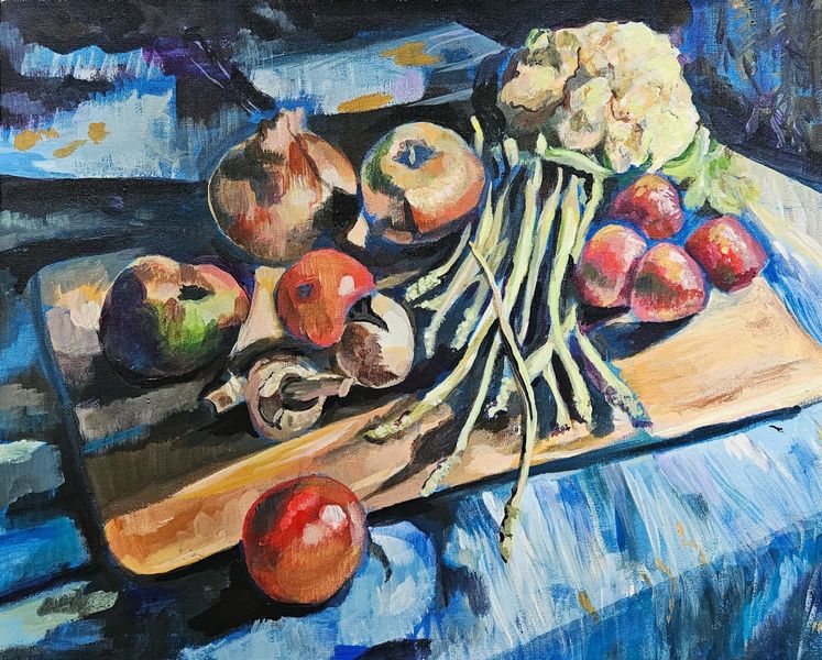 Applease, strawberries, runner beans and onions on a wooden board.