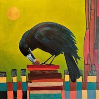 A crow is cracking a hazelnut - yellow green