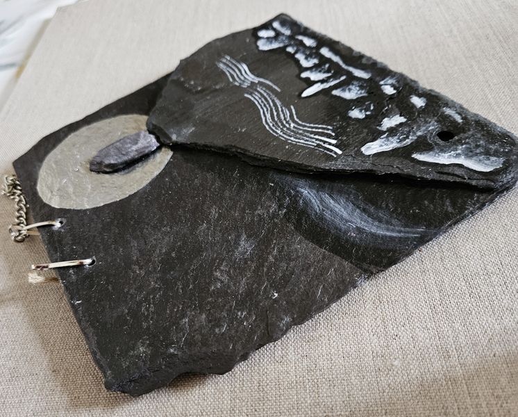 Small Slate relief painting with chain for wall hanging.