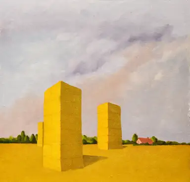 Straw towers in a Suffolk landscape with a smoky sky.