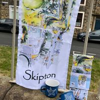 a Tea Towel from artwork recalling Skipton from memory with a focus on important buildings