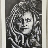 Image of the Morrigan on slate on a greeting card
